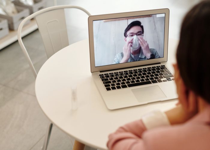 Canva - Woman In A Video Call With A Covid-19 Patient